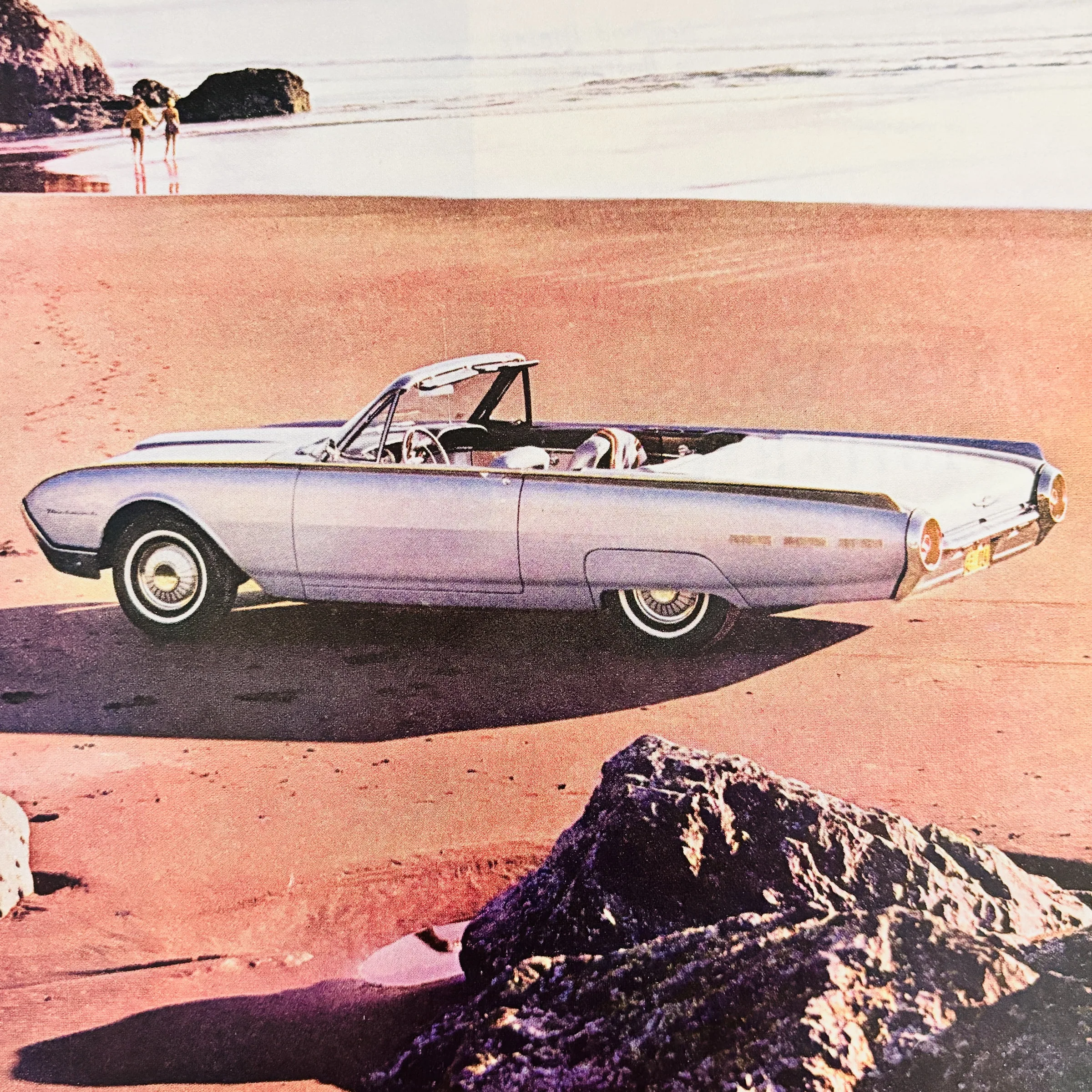 1959 Ford Thunderbird Top Down Convertible on a Rocky Beach Vintage Print Ad