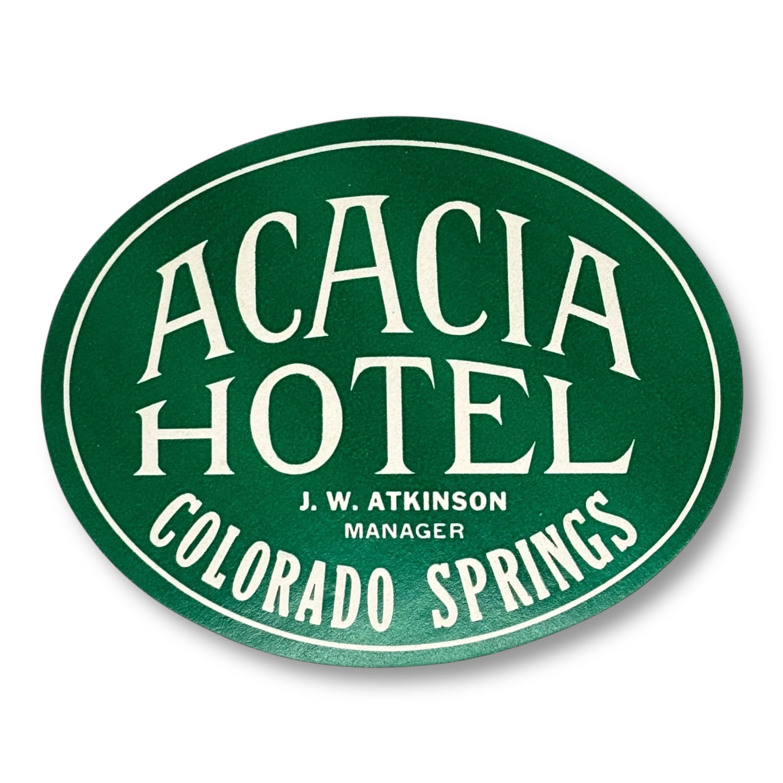 c.1920s Acacia Hotel Colorado Springs Luggage Label Oval Green J.W. Atkinson