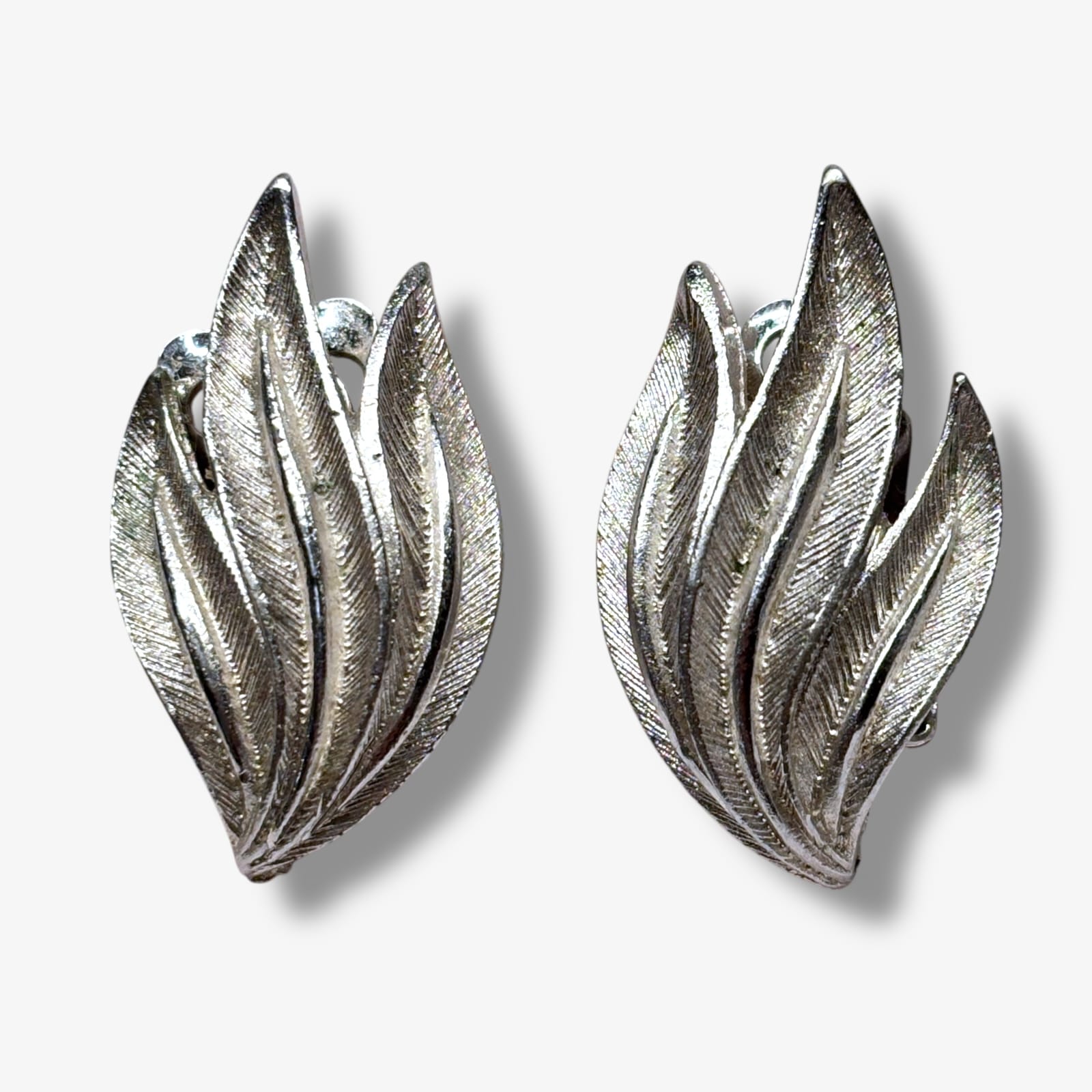 Coro Silver Tone Leaf Clip Earrings Mid Century c.1955 Textured Brushed Metal
