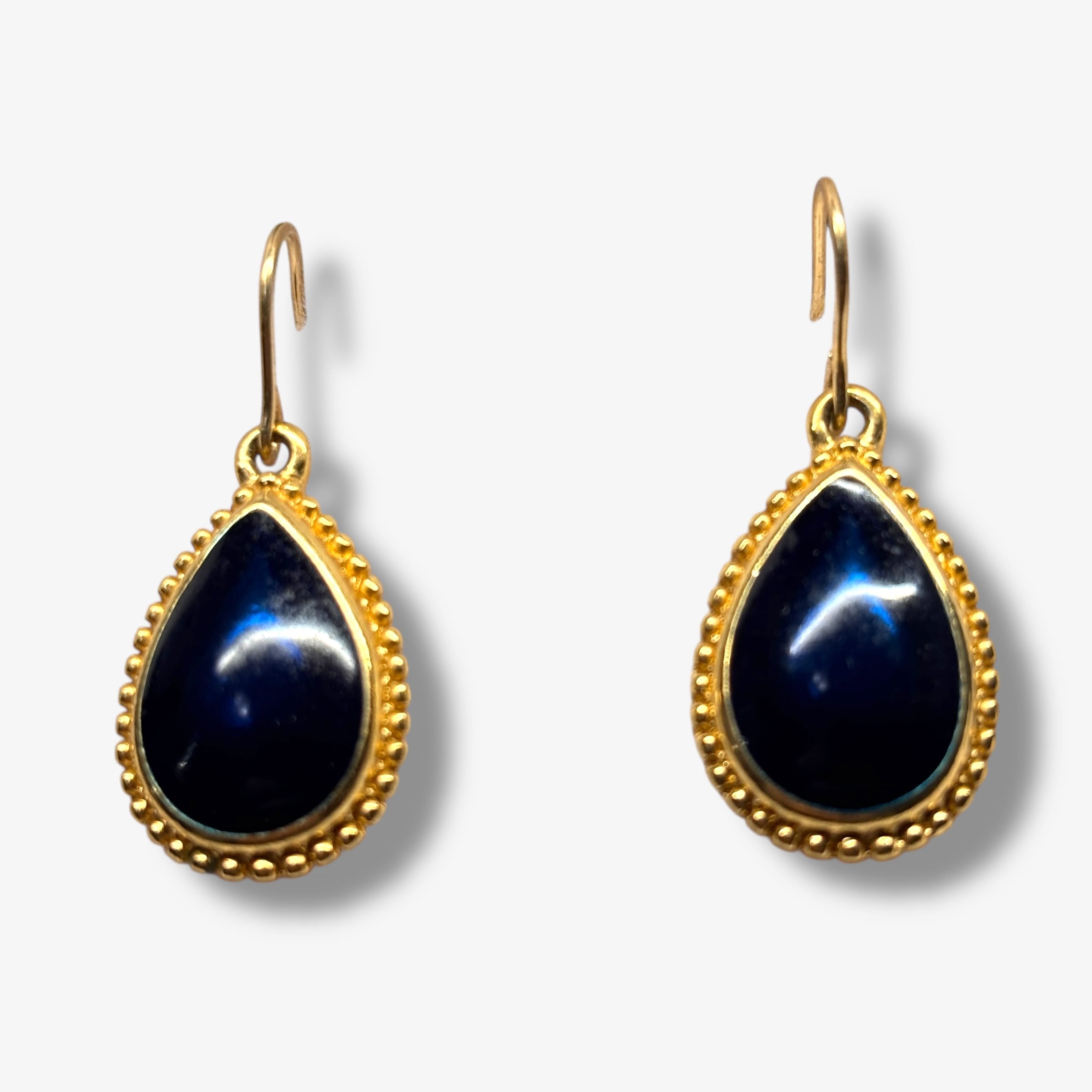 Trifari TM 1980s Gold Tone Teardrop Dangle Earrings With Blue Acrylic Cabochons